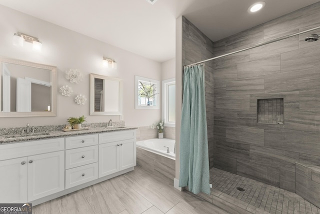 79 Brynbrooke Ct, Dawsonville, GA 30534 - full bathroom featuring a tile shower, a garden tub, and double vanity