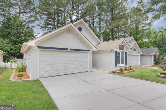 713 Fairfield Dr, Peachtree City, GA 30269 - single story home featuring driveway, an attached garage, a front yard, and stucco siding