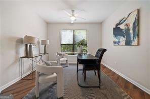 821 Ralph Mcgill Blvd NE Unit 2219, Atlanta, GA 30306 - dining room featuring baseboards, wood finished floors, and ceiling fan