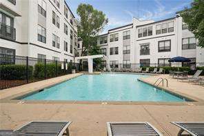 821 Ralph Mcgill Blvd NE Unit 2219, Atlanta, GA 30306 - community pool with a patio area