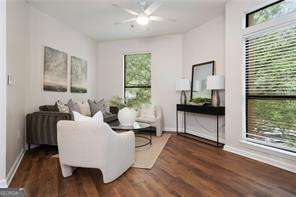 821 Ralph Mcgill Blvd NE Unit 2219, Atlanta, GA 30306 - living area with baseboards, wood finished floors, and ceiling fan