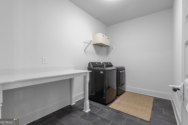 155 Lapis Lake Pt, Fayetteville, GA 30215 - laundry area featuring washer and dryer, baseboards, and dark tile patterned flooring