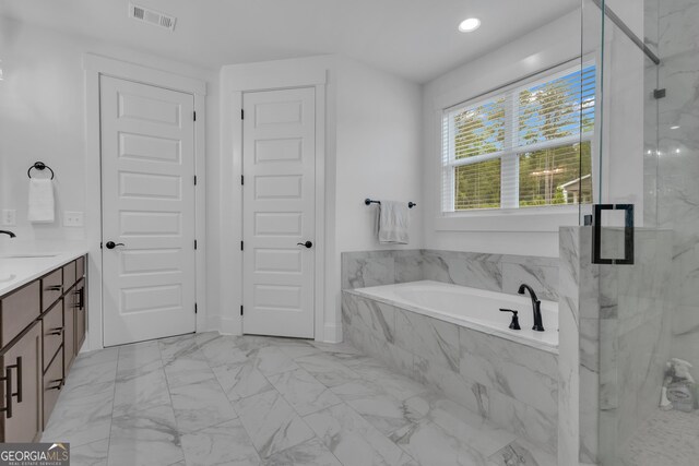 155 Lapis Lake Pt, Fayetteville, GA 30215 - full bathroom with marble finish floors, a marble finish shower, a bath, vanity, and recessed lighting