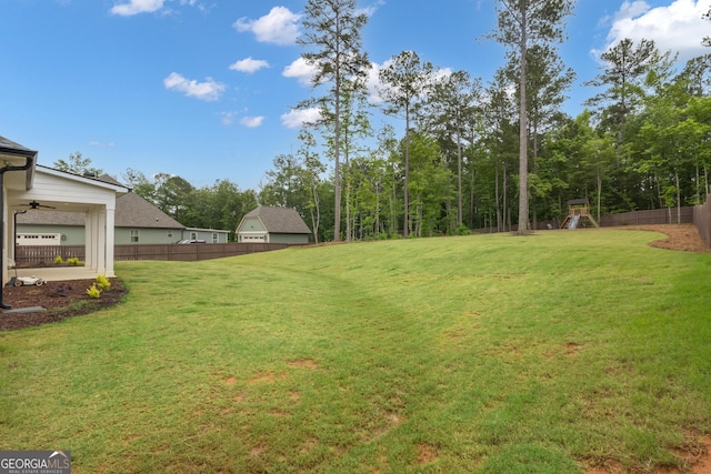 155 Lapis Lake Pt, Fayetteville, GA 30215 - view of yard featuring a playground and ceiling fan
