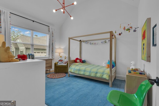 155 Lapis Lake Pt, Fayetteville, GA 30215 - carpeted bedroom with a chandelier and high vaulted ceiling