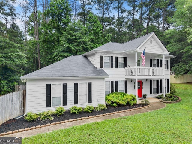 239 Hidden Ct, Winder, GA 30680 - greek revival house with a balcony and roof with shingles