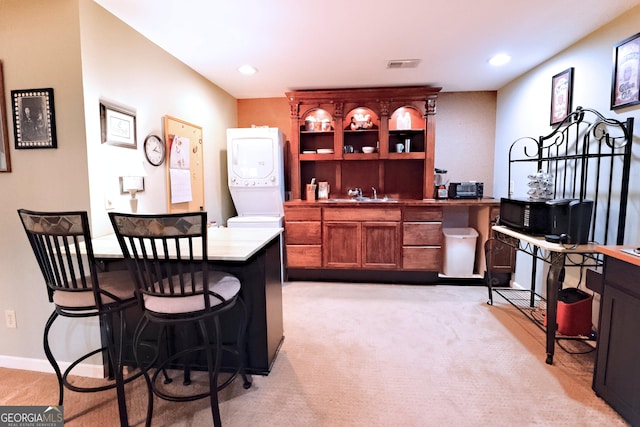 3320 Bryant Ln, Marietta, GA 30066 - bar with stacked washer / drying machine, light colored carpet, and recessed lighting