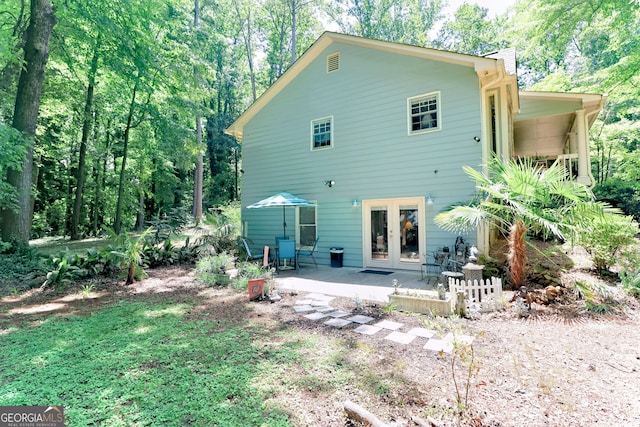 3320 Bryant Ln, Marietta, GA 30066 - back of house with french doors and a patio