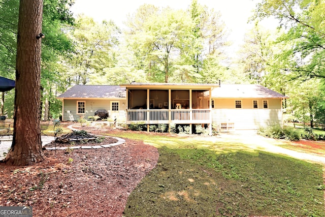 3320 Bryant Ln, Marietta, GA 30066 - rear view of property featuring a sunroom