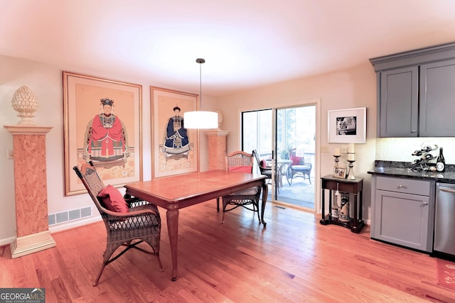 3320 Bryant Ln, Marietta, GA 30066 - dining area with light wood-style flooring and baseboards