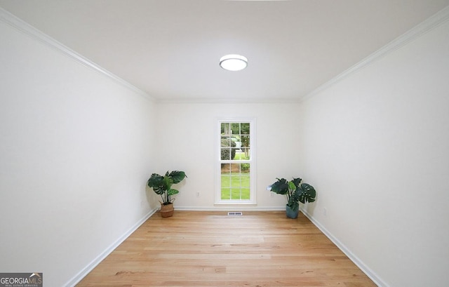 1111 Creekshore Dr, Athens, GA 30606 - empty room featuring wood finished floors, crown molding, and baseboards