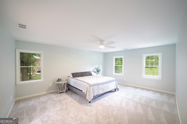 1111 Creekshore Dr, Athens, GA 30606 - bedroom with carpet, baseboards, and a ceiling fan