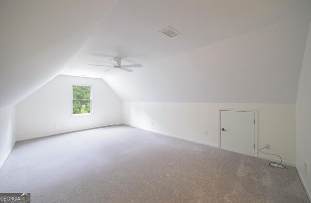 1111 Creekshore Dr, Athens, GA 30606 - additional living space featuring vaulted ceiling, carpet floors, ceiling fan, and baseboards