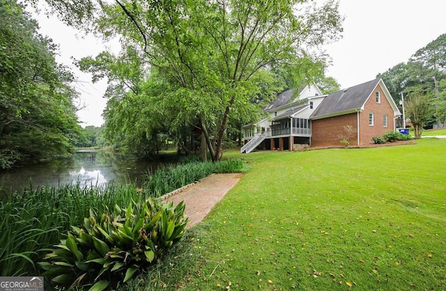 1111 Creekshore Dr, Athens, GA 30606 - view of grassy yard featuring stairway and a deck with water view