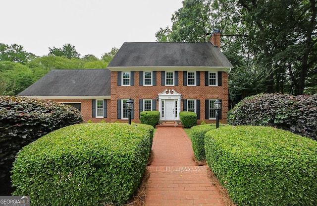 1111 Creekshore Dr, Athens, GA 30606 - colonial inspired home featuring a chimney and brick siding