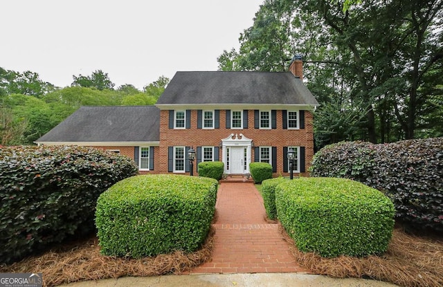 1111 Creekshore Dr, Athens, GA 30606 - colonial home with a chimney and brick siding