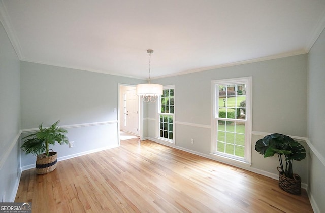1111 Creekshore Dr, Athens, GA 30606 - unfurnished room featuring light wood-style flooring, a chandelier, baseboards, and crown molding
