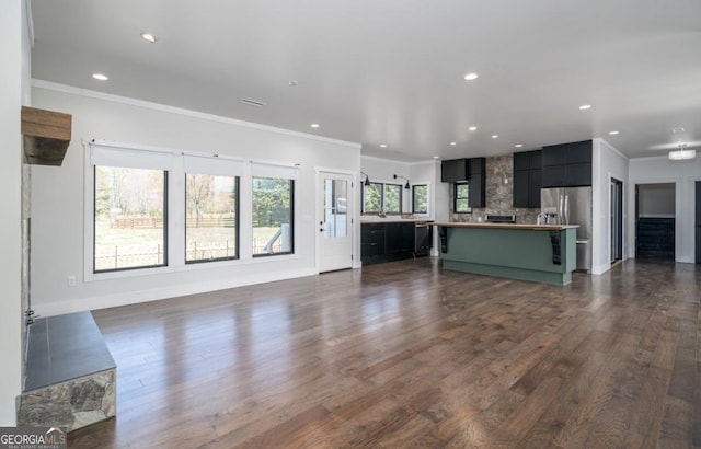 114 Cartecay River Run, Ellijay, GA 30536 - unfurnished living room with dark wood-style flooring, recessed lighting, and crown molding