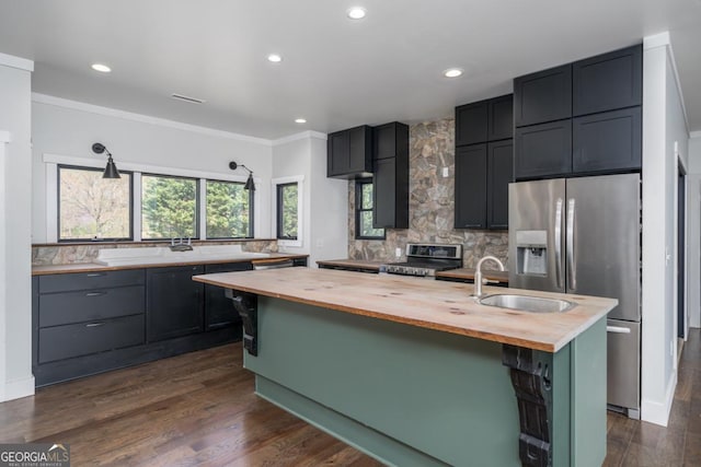 114 Cartecay River Run, Ellijay, GA 30536 - kitchen with wooden counters, appliances with stainless steel finishes, backsplash, a center island with sink, and recessed lighting