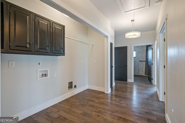 114 Cartecay River Run, Ellijay, GA 30536 - laundry area featuring cabinet space, attic access, washer hookup, dark wood-style flooring, and baseboards