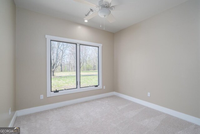 114 Cartecay River Run, Ellijay, GA 30536 - spare room with light colored carpet, baseboards, and ceiling fan