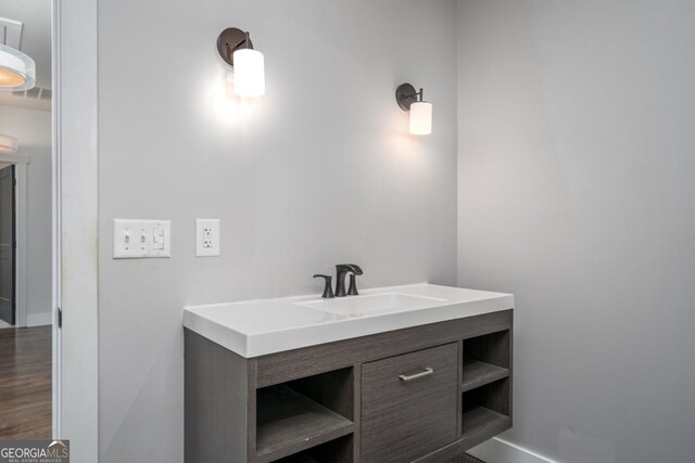 114 Cartecay River Run, Ellijay, GA 30536 - bathroom with wood finished floors, vanity, and baseboards