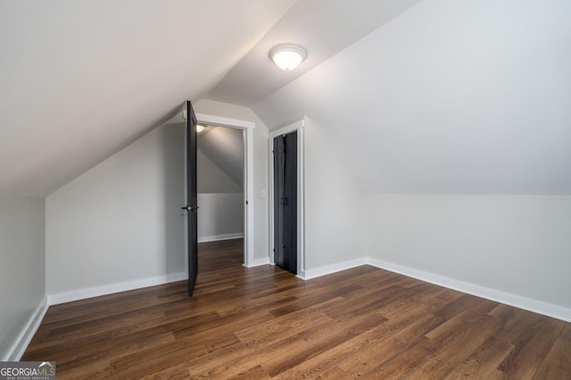114 Cartecay River Run, Ellijay, GA 30536 - additional living space with lofted ceiling, dark wood-style floors, and baseboards