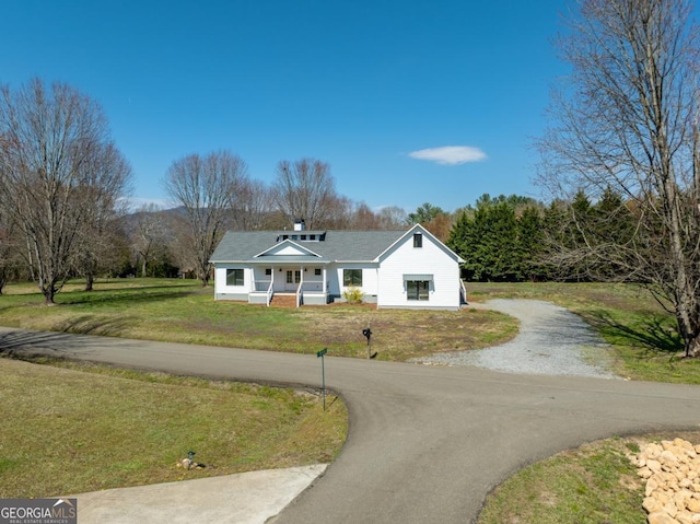 114 Cartecay River Run, Ellijay, GA 30536 - view of front of house featuring driveway, covered porch, and a front yard
