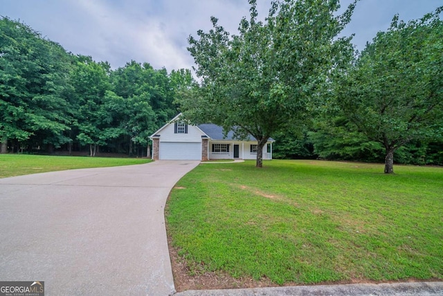 40 Heather Woods Ct, Covington, GA 30016 - view of front of home with a front lawn, concrete driveway, a garage, and brick siding