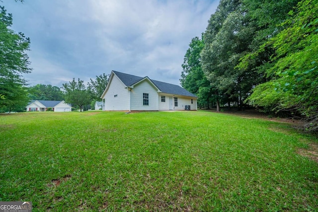 40 Heather Woods Ct, Covington, GA 30016 - back of house with a yard