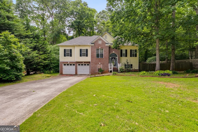 129 Onyx Ct, Carrollton, GA 30116 - split foyer home featuring brick siding, concrete driveway, and a garage