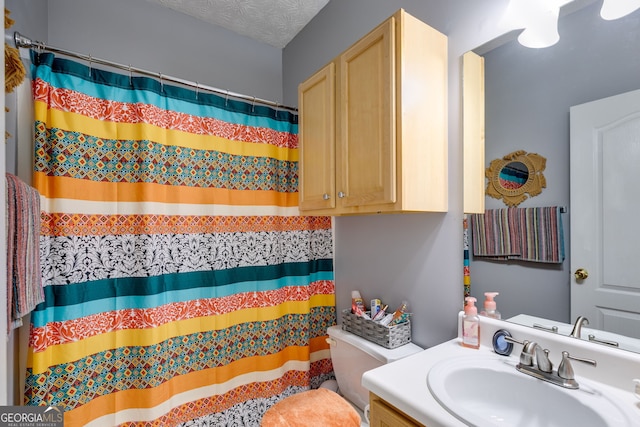 129 Onyx Ct, Carrollton, GA 30116 - bathroom featuring vanity, toilet, and curtained shower