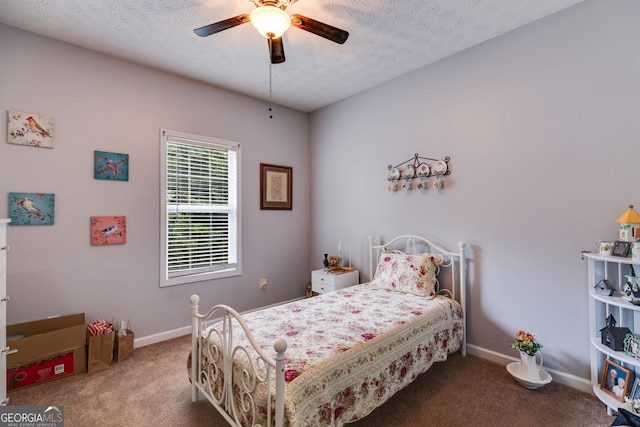 129 Onyx Ct, Carrollton, GA 30116 - bedroom with carpet floors, baseboards, a textured ceiling, and ceiling fan