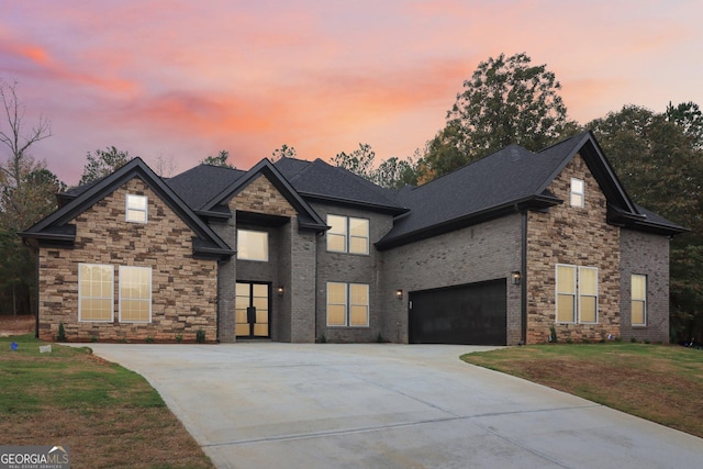 4186 Matisse Ln, Fairburn, GA 30213 - view of front of home featuring concrete driveway, a front yard, stone siding, a garage, and a shingled roof