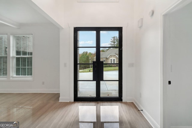 4186 Matisse Ln, Fairburn, GA 30213 - entryway with wood finished floors and french doors