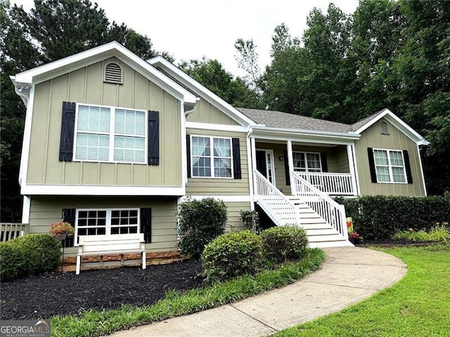 298 Moorings Run, Jasper, GA 30143 - view of front facade featuring board and batten siding, a porch, and stairway