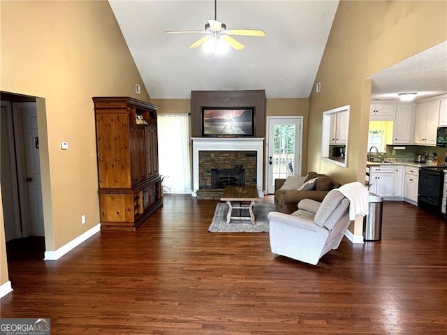 298 Moorings Run, Jasper, GA 30143 - living room with high vaulted ceiling, ceiling fan, a fireplace, and dark wood-style flooring
