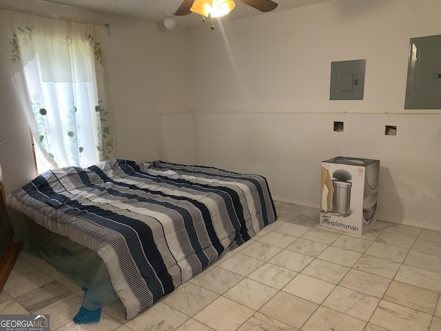 6570 Laurens Way, Stone Mountain, GA 30087 - bedroom featuring electric panel, light marble finish flooring, and ceiling fan