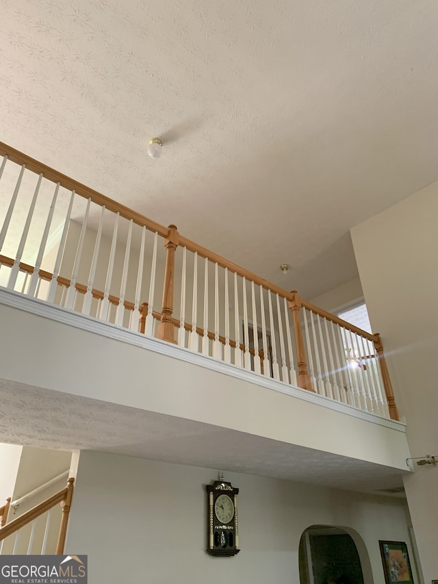 6570 Laurens Way, Stone Mountain, GA 30087 - stairway featuring a high ceiling