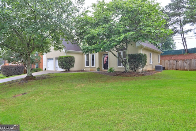 2230 Laurel Lake Dr, Suwanee, GA 30024 - obstructed view of property featuring concrete driveway, stucco siding, and an attached garage