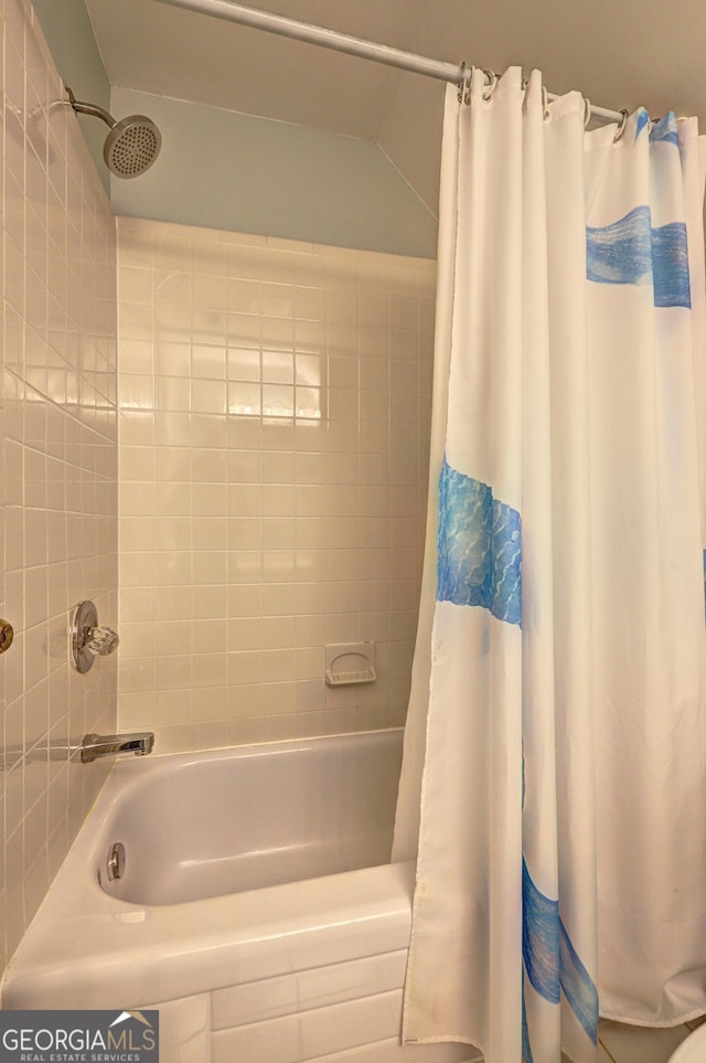 2230 Laurel Lake Dr, Suwanee, GA 30024 - full bathroom with shower / bath combo with shower curtain