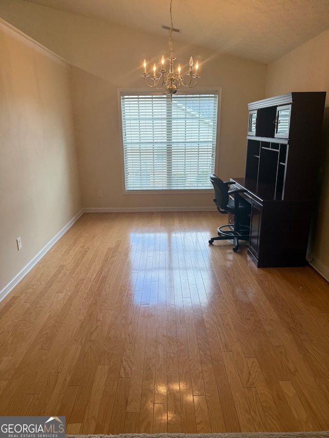 1925 Cedar Walk Ln, Conley, GA 30288 - office area with a chandelier, light wood-type flooring, vaulted ceiling, and baseboards