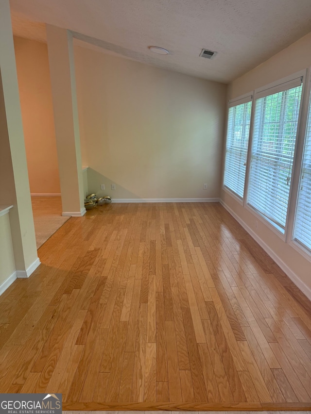 1925 Cedar Walk Ln, Conley, GA 30288 - unfurnished room with light wood-style flooring and baseboards