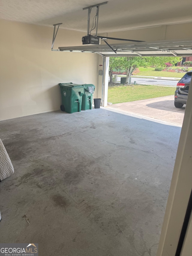 1925 Cedar Walk Ln, Conley, GA 30288 - garage featuring a garage door opener