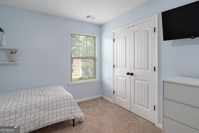 304 Boomer Ct, Guyton, GA 31312 - bedroom with carpet flooring, a closet, and baseboards