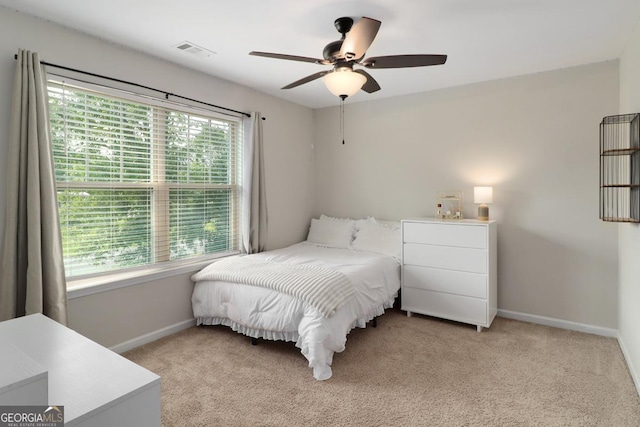 304 Boomer Ct, Guyton, GA 31312 - bedroom featuring baseboards, light carpet, and ceiling fan