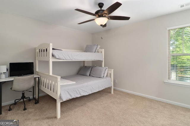 304 Boomer Ct, Guyton, GA 31312 - bedroom featuring carpet flooring, multiple windows, and baseboards