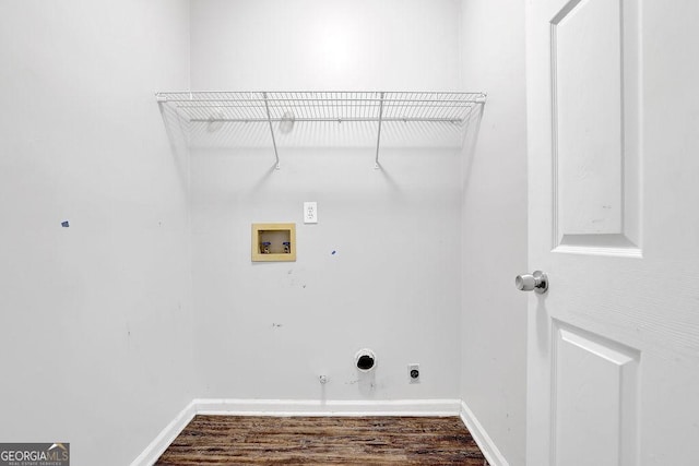 6708 Thornwood Ct, Flowery Branch, GA 30542 - laundry area featuring hookup for a washing machine, gas dryer hookup, hookup for an electric dryer, dark wood finished floors, and baseboards