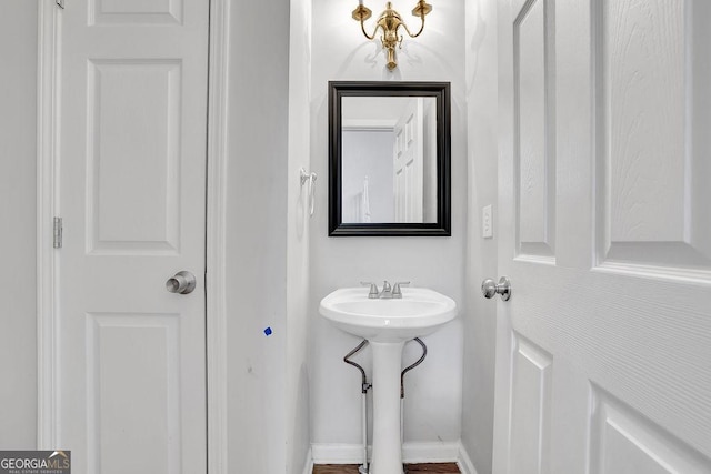6708 Thornwood Ct, Flowery Branch, GA 30542 - bathroom featuring baseboards