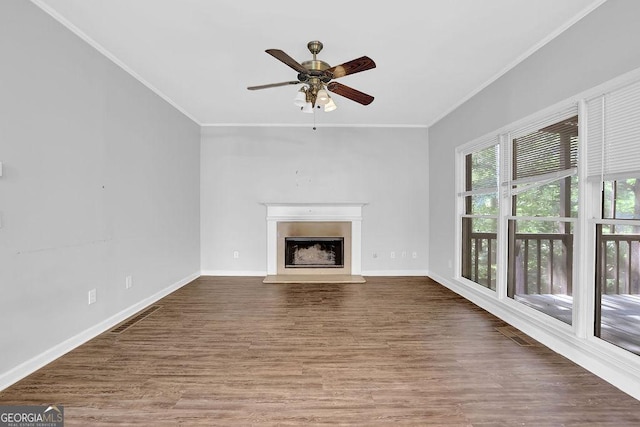 6708 Thornwood Ct, Flowery Branch, GA 30542 - unfurnished living room featuring ornamental molding, wood finished floors, ceiling fan, baseboards, and a fireplace with raised hearth